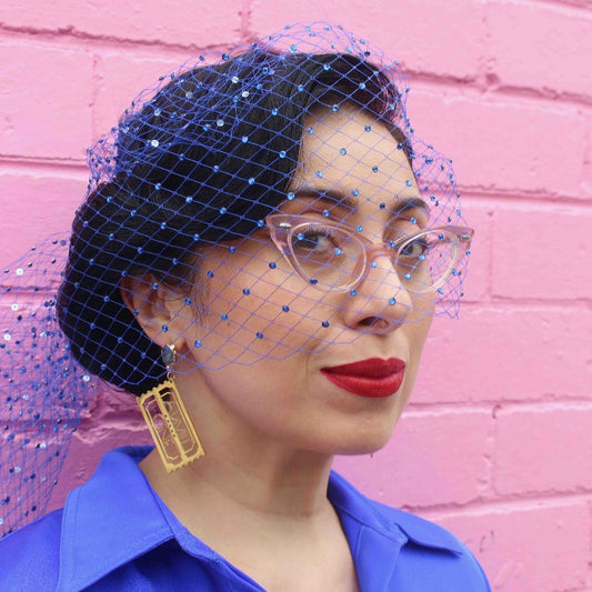 "Golden Ticket" 18K Gold Statement Earrings shaped as a Ticket with text that reads Admit One featuring Aquamarine rough cut crystals