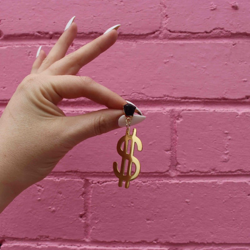 "Dollar Dollar Bill" 18K Gold Statement Earrings shaped as a dollar sign featuring Black Obsidian rough cut crystals